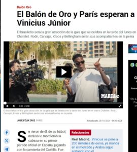 Captura de pantalla de un artículo que anuncia la presencia de Vinicius Júnior en la gala del Balón de Oro en París. La imagen muestra un titular que dice "El Balón de Oro y París esperan a Vinicius Júnior", junto con información sobre otros jugadores que estarán presentes en la gala.